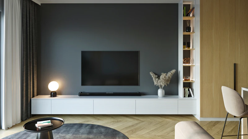 Modernes Wohnzimmer mit Fernseher an der Wand